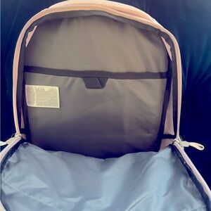 North face pink laptop backpack. Used about a month for work. Great backpack.